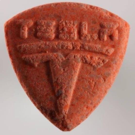 Orange Tesla Pill